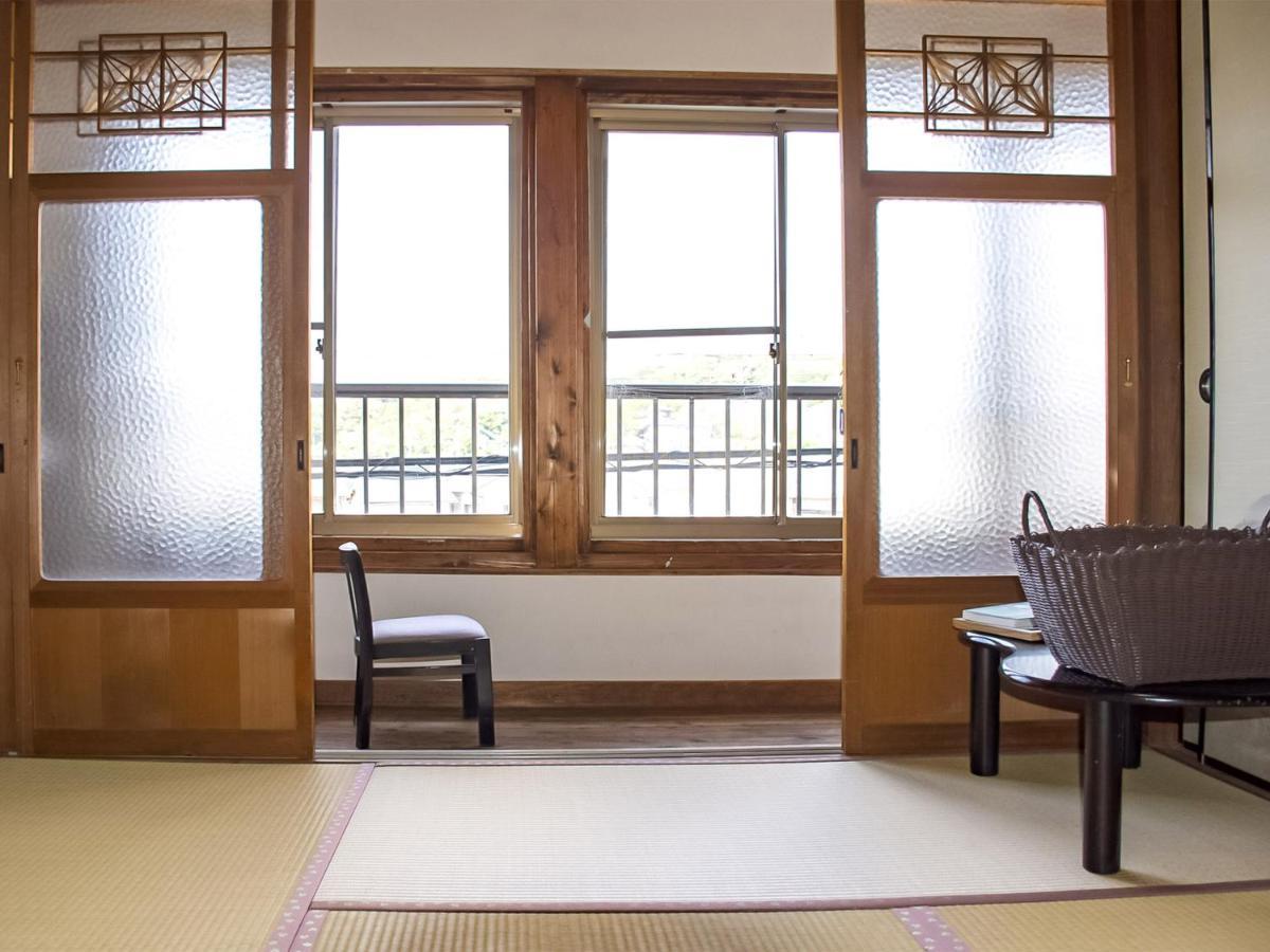 Guest Cafe Kuchikumano Hotell Kamitondacho Exteriör bild